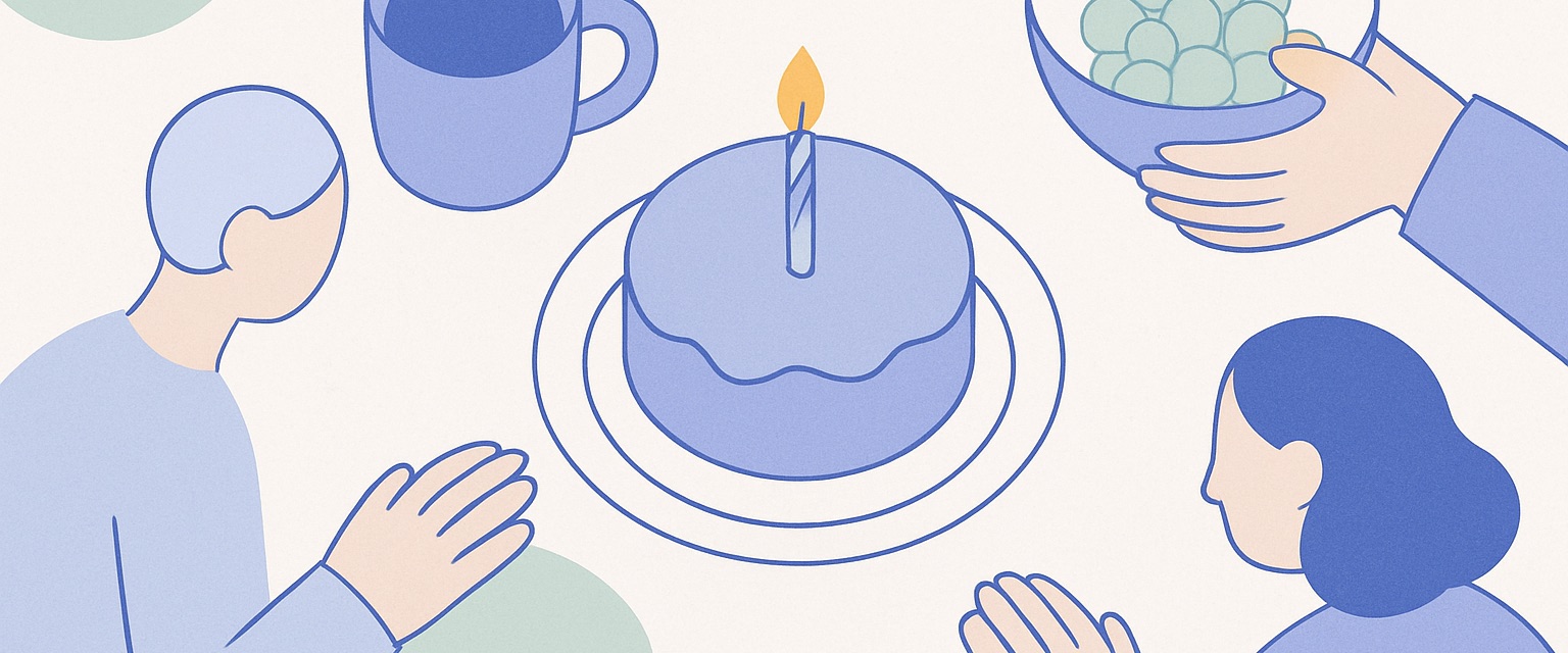 誕生日のケーキを囲む食卓